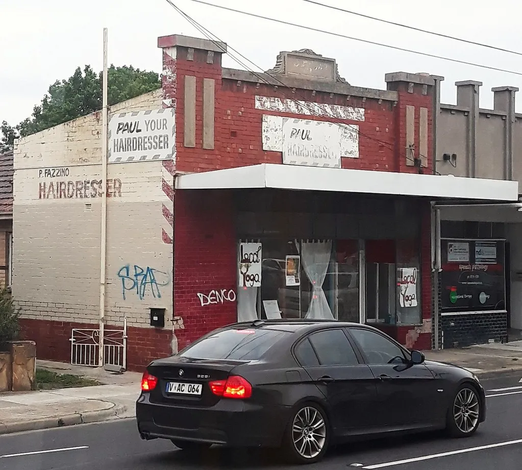 Single-storey brick veneer home with a front lawn on a quiet Perth suburban street