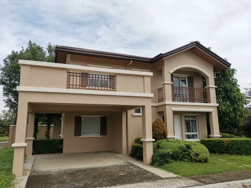 New double-storey homes along a freshly kerbed street in an outer suburban estate